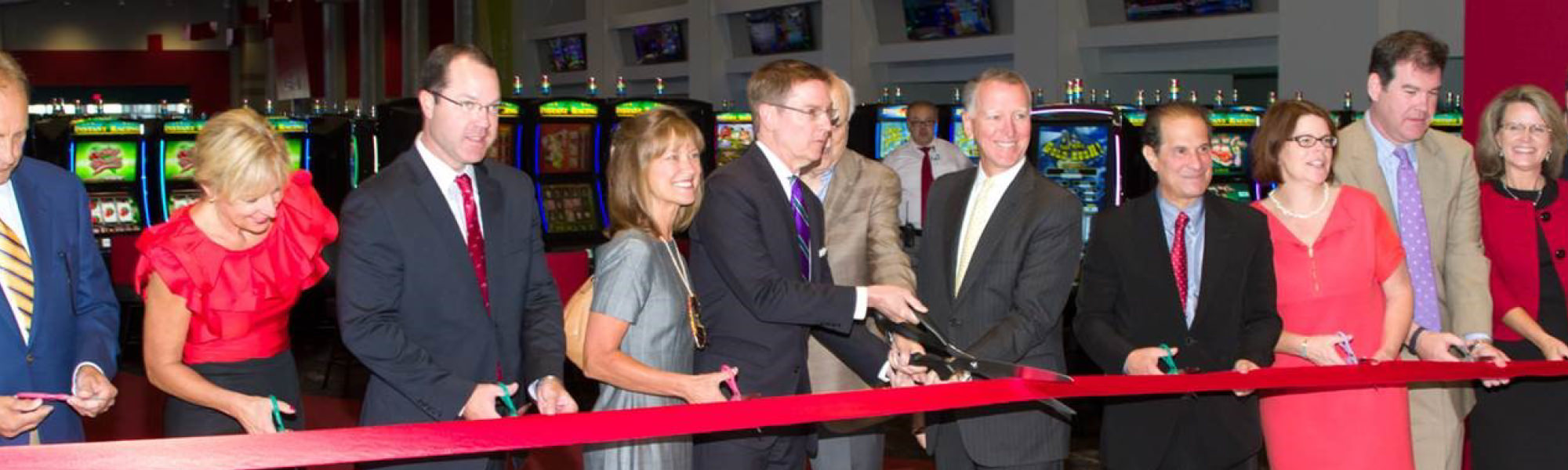 People cutting ribbon